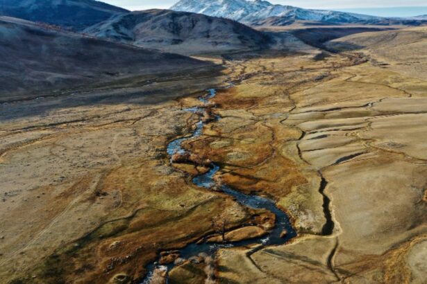 Two tectonic geo plates colliding to form volcanic mountains