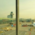 Airport terminal and control tower view near Heathrow airport lost property desk