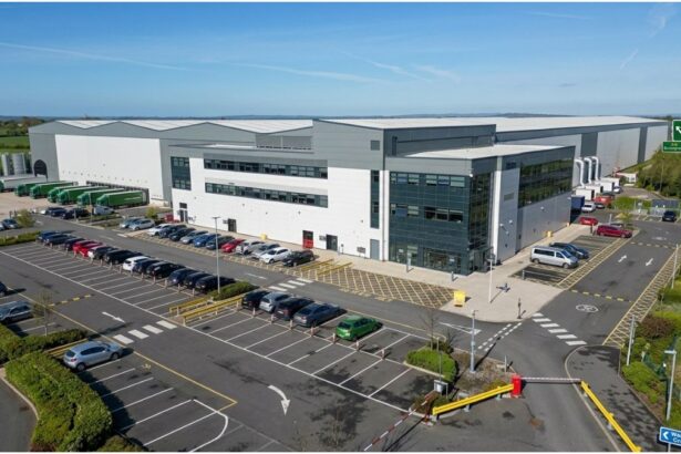 Aerial view of a large commercial logistics building and car park at Fradley Park, Staffordshire.
