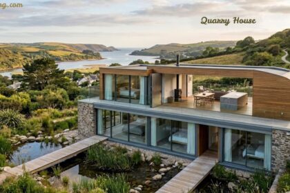 Modern quarry house with a landscaped stone exterior and coastal views