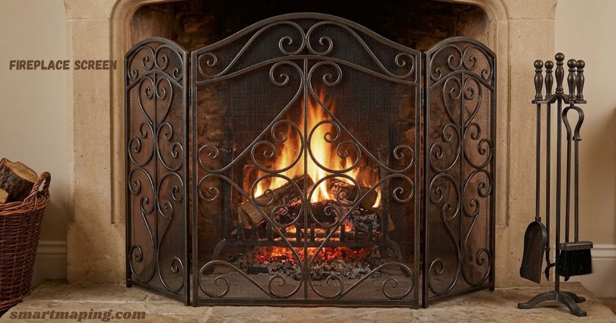 Ornate black fireplace screen protecting a traditional stone fireplace with a burning fire.